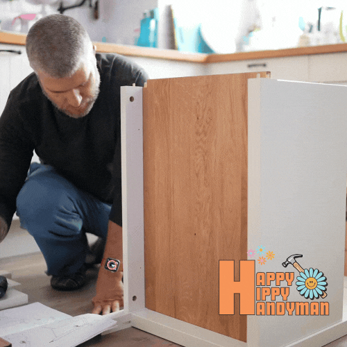 Man putting together a wooden cabinet, showcasing practical furniture assembly methods