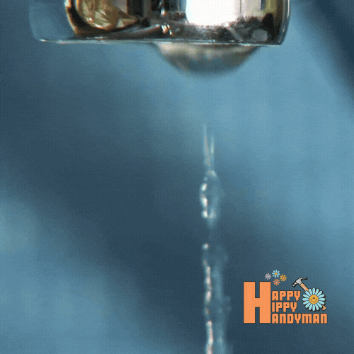 Close-up of a dripping sink faucet, illustrating the need for plumbing maintenance.