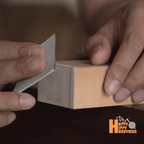 Finalizing a custom wooden accent with precision, highlighting the meticulous artistry of Lite Carpentry.
