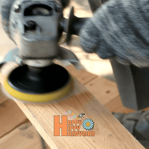 Carpenter smoothing a wooden surface with care, embodying the refined touch of Lite Carpentry.