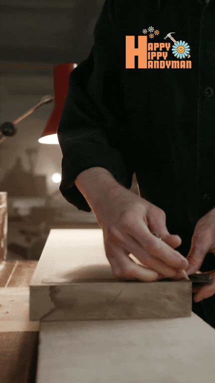 Close-up of a carpenter marking a wooden board for cutting, exemplifying the detailed craftsmanship of Lite Carpentry.
