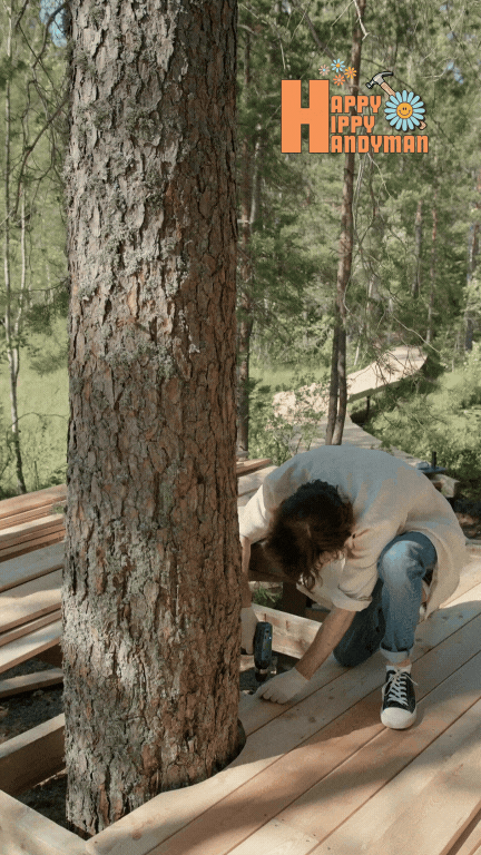 skilled handyman constructing a deck around a mature tree, seamlessly blending nature with craftsmanship in Outdoor Projects.