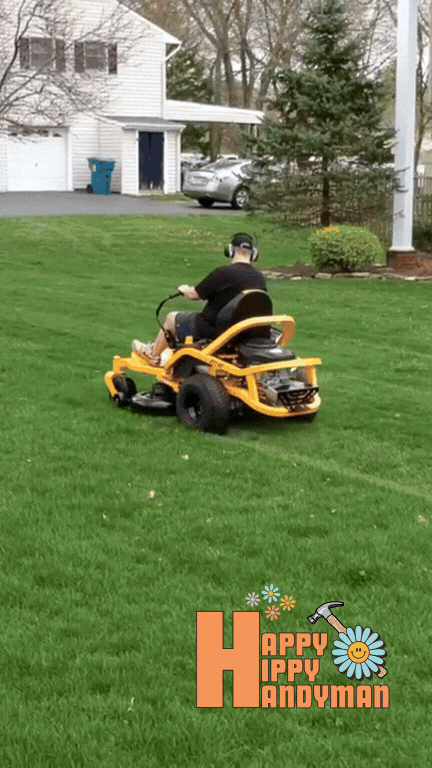 Man operating a yellow riding lawn mower across a green lawn, showcasing professional landscaping for a well-maintained yard.”