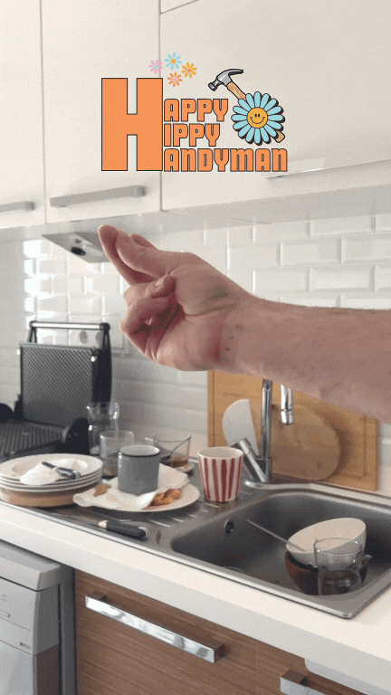 A man snapping his fingers in a cluttered kitchen, instantly transforming it into a spotless space, capturing the swift impact of a Handy Home Helper.