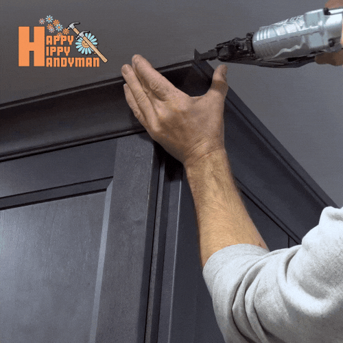 Handyman using a power tool on a project, demonstrating efficient and modern Handyman Home Improvements.